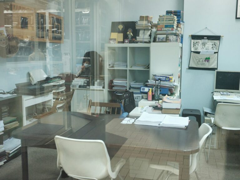 a room filled with lots of clutter and furniture