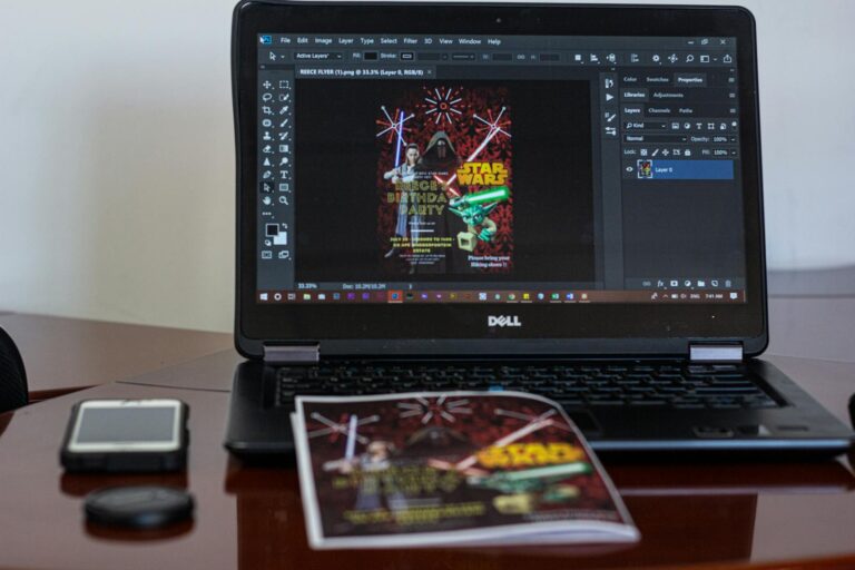 Lead-Magnet PDF: So gewinnst du mit wertvollen Inhalten neue E-Commerce-Kunden A laptop displaying Star Wars party invitation design in a workspace setting.